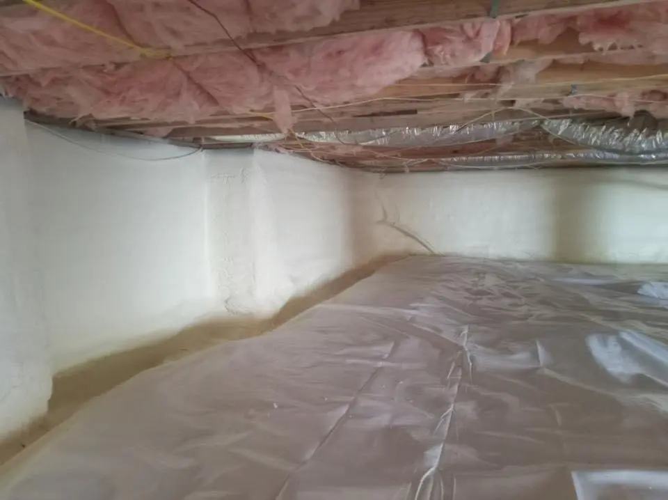 Crawl space encapsulation with closed-cell spray foam for Commercial Roof Restoration in Doolittle